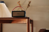 Sangean RA-101 Black Gold. Diseño Retro de Madera y Piel sintética. Bluetooth 5.0. Autonomía 19 Horas con una Carga Completa. AUX-in para Fuentes de Audio externas.