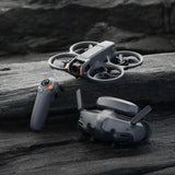 DJI Avata 2 Fly More Combo (1 batería) Bundle, Drone FPV con cámara, con protección de la hélice, voltea/rueda con sólo pulsar un botón, drone con cámara de contenidos POV, incl Goggles 3y RC Motion 3