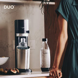 SodaStream Aireador de agua DUO sin cilindro de CO2, 1 botella de cristal de 1 l y 1 botella de plástico apta para lavavajillas de 1 l, altura: 44 cm, color: titanio, 19,1 x 36,6 x 44,5