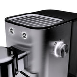 WMF Lono - Cafetera expreso con 2 portafiltros, 1350 W, para 1-2 tazas de espresso, 15 bares, reposavasos, espumador de leche, cuchara prensadora de café, acero inoxidable mate