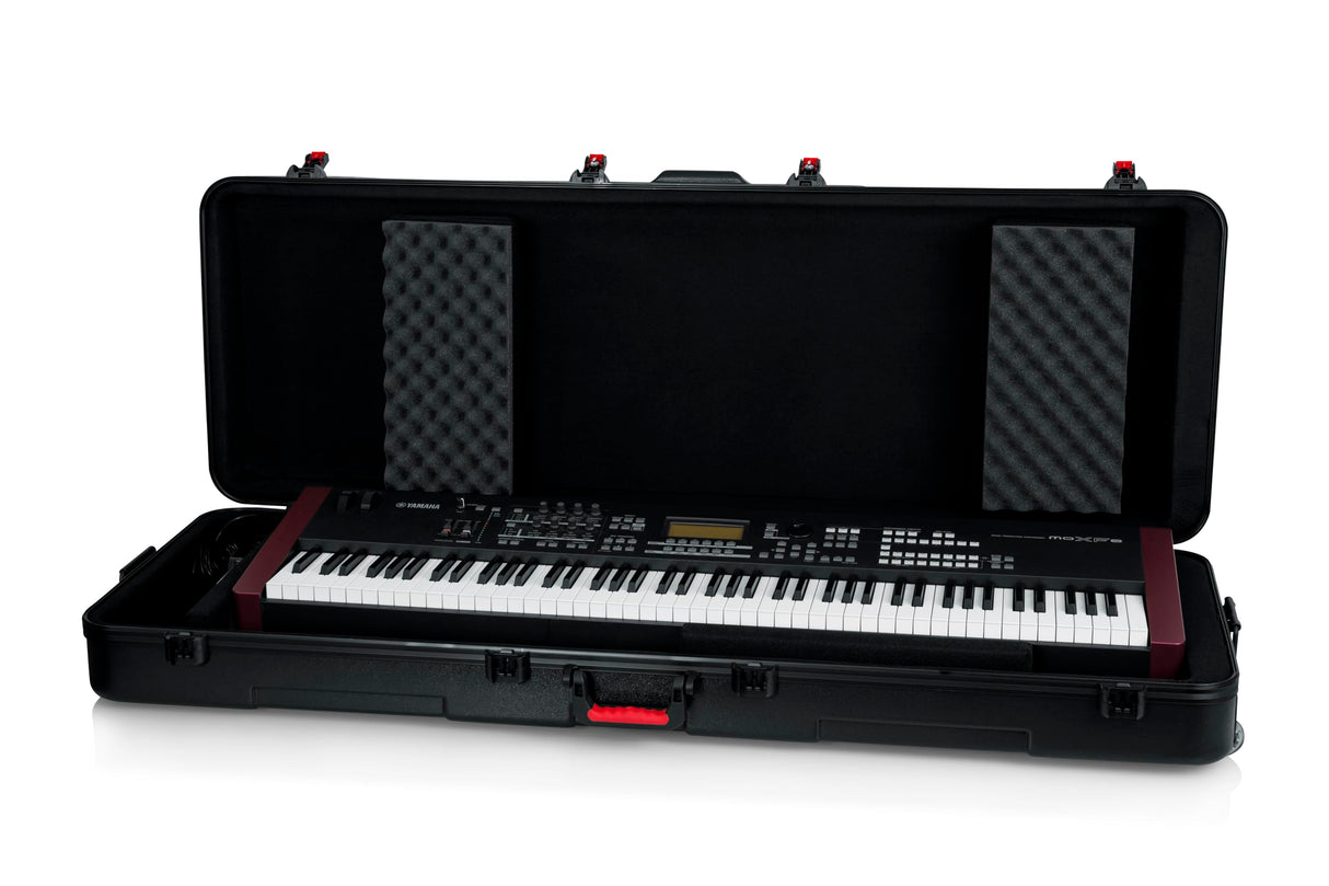 Gator Cases Frequent Flyer TSA - Estuche para teclado de polietileno moldeado ATA con ruedas para teclados extraprofundos de 88 notas (GTSA-KEY88D)
