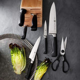 Zwilling 31081261 Cuchillo para jamón de cuatro estrellas con hueco, acero inoxidable especial, fusión especial, plástico, 25 cm, negro