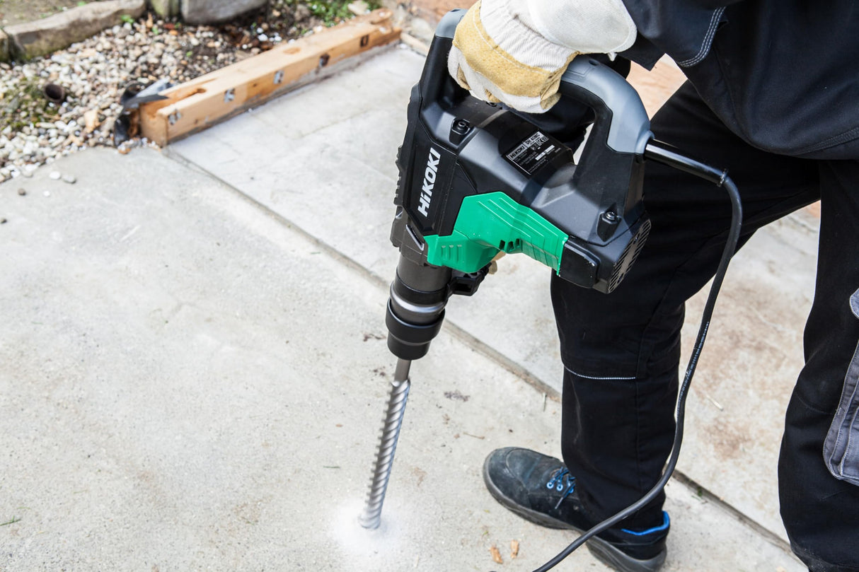 HiKOKI Martillo perforador y cincelador SDS-Max - 1100 W, 7,1 J de energía de impacto, 40 mm de diámetro de perforación, 2800/min de tasa de impacto - Baja vibración, mango ergonómico - Incl. maletín