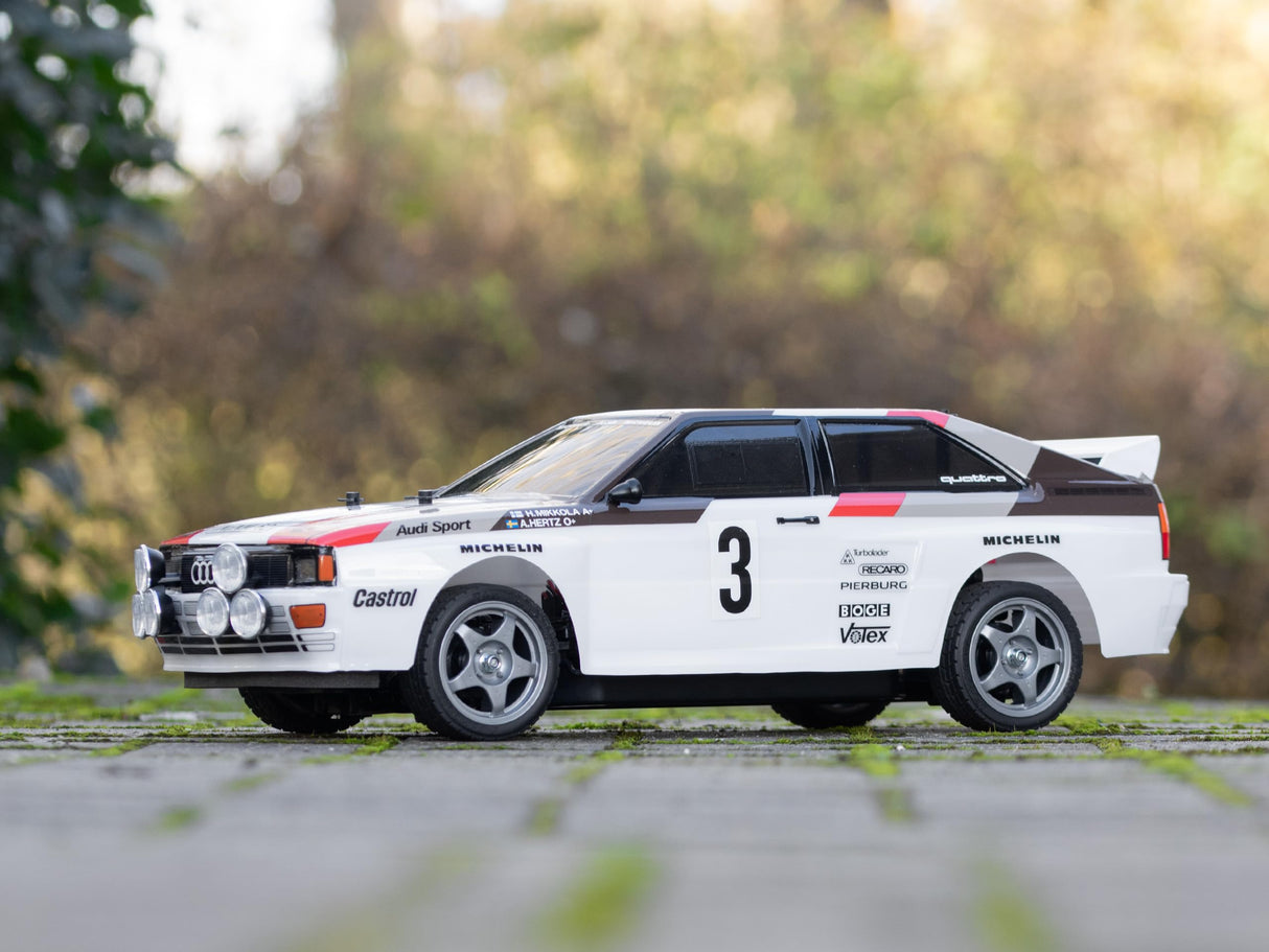 TAMIYA TAM58667 58667 Audi 300058667 RC Quattro Rally A2 (TT-02), maqueta de Coche teledirigido, Escala 1:10, Kit de construcción para Hobbies, para Montar, Color Blanco