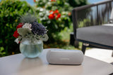 Harman Kardon Luna, Altavoz portátil, Resistente al Agua y al Polvo, con diseño Elegante, tecnología Bluetooth, Puerto USB y duración de batería de hasta 12 hrs, Gris
