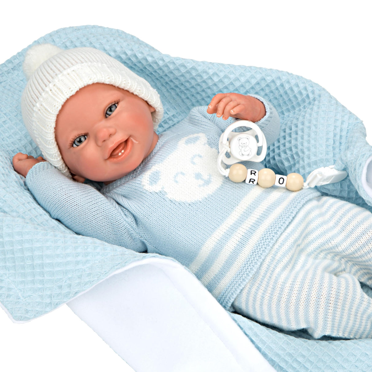 ARIAS - Muñeco Reborn Paulo de 40 cm, con ropita Azul a Rayas y Manta a Juego, bebé recién Nacido con Cuerpo de Vinyl, Accesorios Chupete y chupetero, Juguete para niños Desde +3 años (ARI98148)