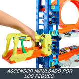Hot Wheels City “Let's Race - ¡a Correr!” Netflix - Garaje definitivo Pista para Coches de Juguete con dragón y 4 Niveles, Incluye 2 vehículos, +4 años (Mattel HKX48)