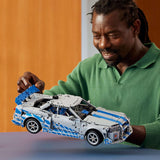 LEGO Technic Coche Nissan Skyline GT-R (R34) de 2 Fast 2 Furious - Kit de Maqueta de Coche para Adultos - Función de Derrape, Dirección, Suspensión y Motor de 6 Cilindros - Regalo para Hombres 42210