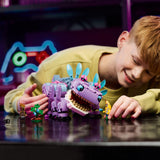 LEGO Fortnite Klombo- Figura de Dinosaurio para Jugar y Exponer - Minifiguras de Banano Aventurero Isleño y Oro - Regalo Gamer para Niños y Niñas de 10+ Años Fans del Videojuego 77077
