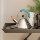 Alessi Kettle 9093/1 LAZ - Hervidor de Design, para la Cocción por Inducción, Fondo en Acero Inoxydable 18/10 Brillante con Mango y Chiflete en Forma de Pajarito en PA, Azul, 100cl