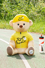 Gipsy Toys - Peluche Oso Camiseta y Gorra ganadora Paso Amarillo 60 cm - Peluche Oficial del Tour de Francia. Majestuosa, Deleitará a Pequeños y Grandes Fans.