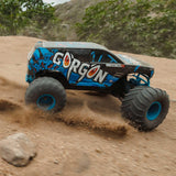 ARRMA 1/10 Gorgon 2WD RTR Monster Truck Mega 550 14T Motor de Cepillo, Espectro SLT2 2,4 GHz, Incluye batería NiMH de 3300 mAh y Cargador USB-C S120, Color Azul