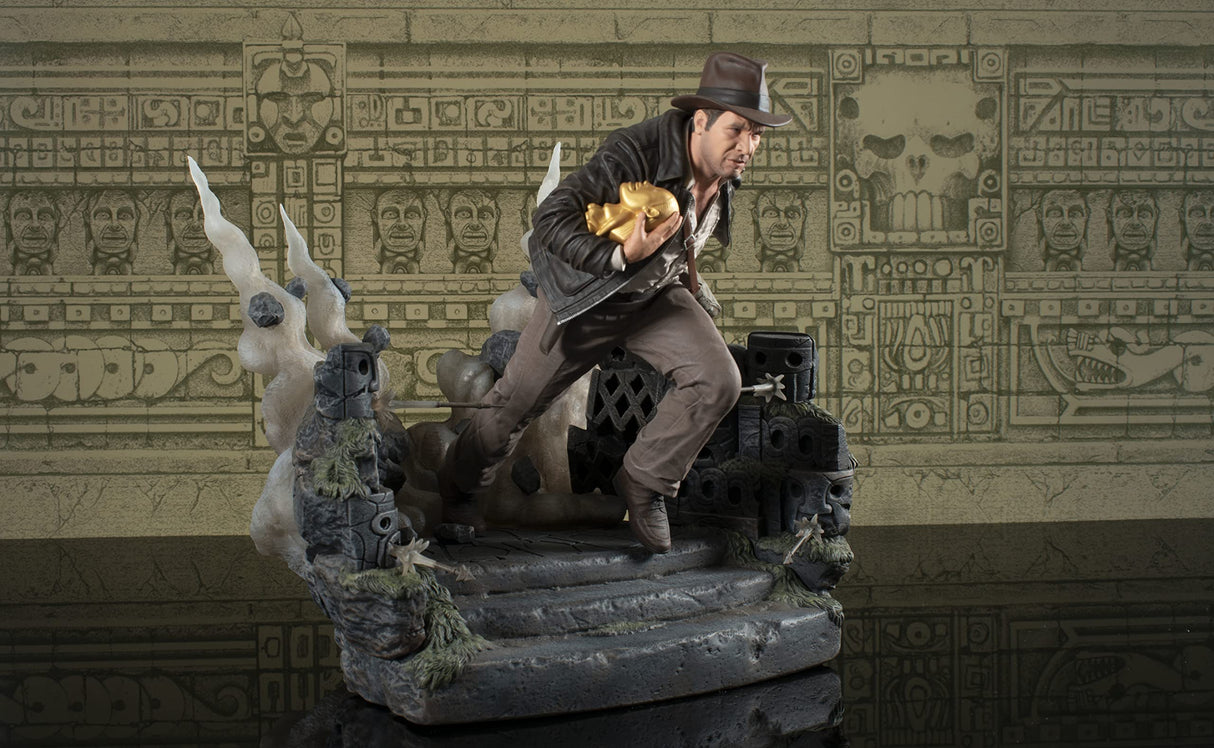 Estatua Indiana Jones HUYENDO con ÍDOLO 25CM