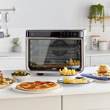 Ninja Foodi Horno multifunción 10 en 1, Mini horno portátil para encimeras y superficies de trabajo, 10 funciones de cocción, Freír con aire, Asar, Parrilla, Hornear y más, en plata y negro, DT200EU