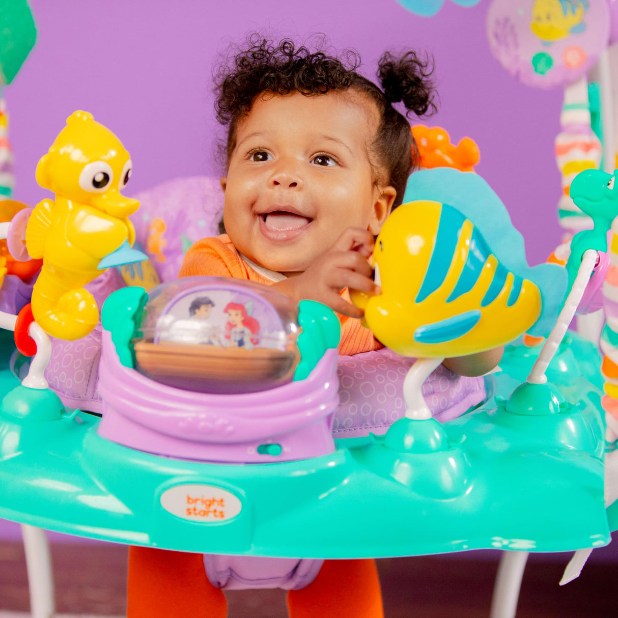 Bright Starts, Sea of Activities: Saltador de Actividades para Bebés de La Sirenita de Disney, con Juguetes Interactivos, Luces y Música, Incluye Princesa Ariel, 6-12 Meses (Azul)