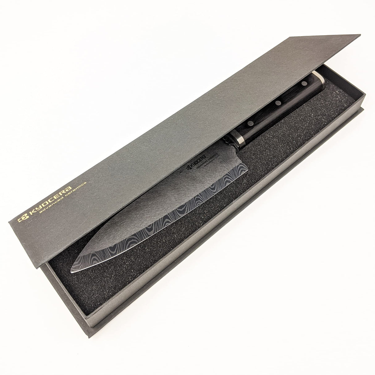 KYOCERA KTN de 180 de Hip kizuna Serie – Cuchillo de cerámica. Cubierto con Incluido Hoja de cerámica con Arena Jardín Estructura de Onda. Mango de Madera de Pakka. Longitud de la Hoja: 18 cm.