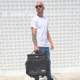 UDG U9981BL/OR Deluxe - Maletín con ruedas para dj (interior de color naranja), color negro
