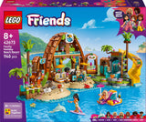 LEGO Friends Hotel de Vacaciones Familiares en la Playa - Juguete con 6 Mini Muñecas, Figuras de Animales (Tortuga y Delfín), Heladería y Accesorios - Regalo para Niñas de 8+ Años 42673