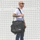 UDG U9981BL/OR Deluxe - Maletín con ruedas para dj (interior de color naranja), color negro