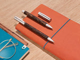 Faber-Castell 138150 - Portaminas con Cuerpo en Madera de Coco de Color Marron - Mina de 0.7 mm - Graduación B