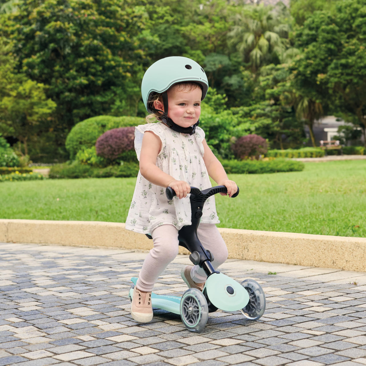 Globber - GO•UP Active Lights 360 - Patinete evolutivo con Asiento Giratorio 360°, reposapiés, Luces LED y 3 Ruedas, para niños de 15 Meses a 6 años - Rosa Pastel